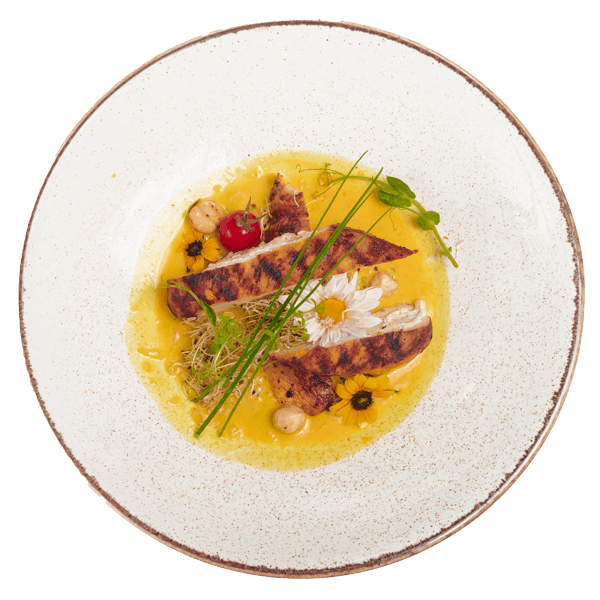 a-close-up-of-a-gourmet-dish-with-grilled-chicken-LV9N72W.png